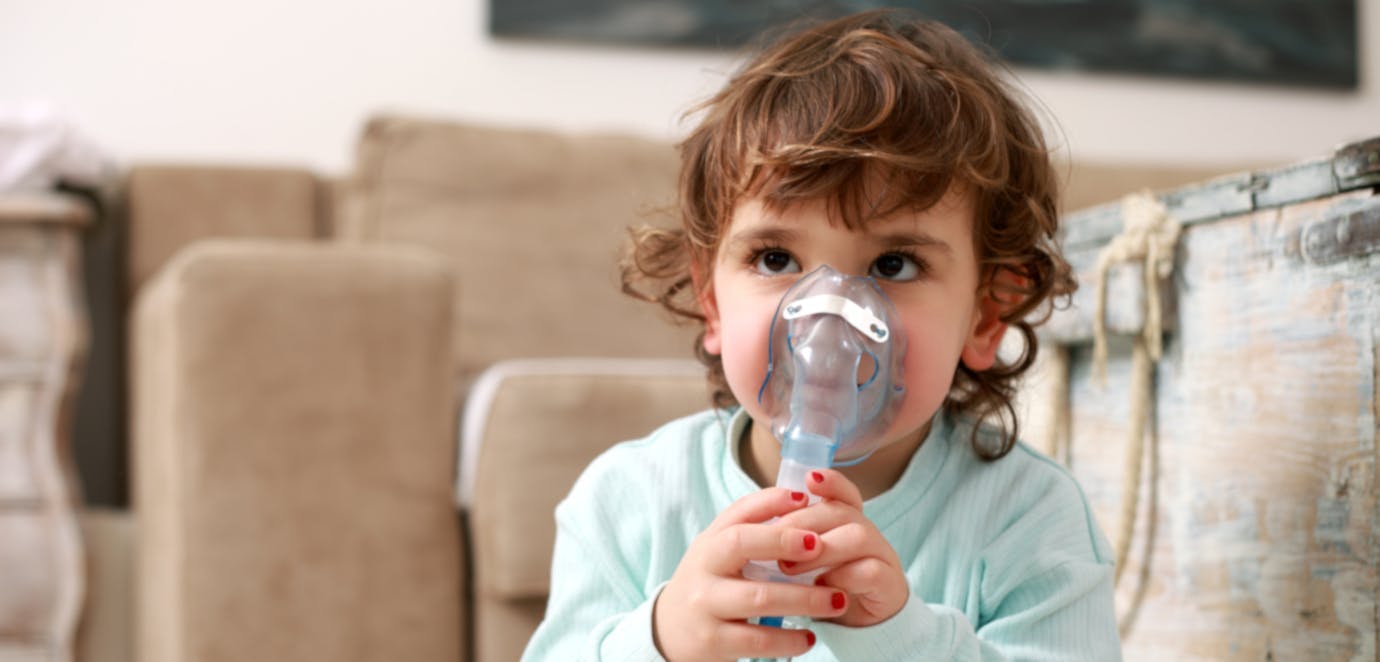 A child with a nebulizer